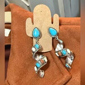 Cute fun faux turquoise earrings. Never worn!